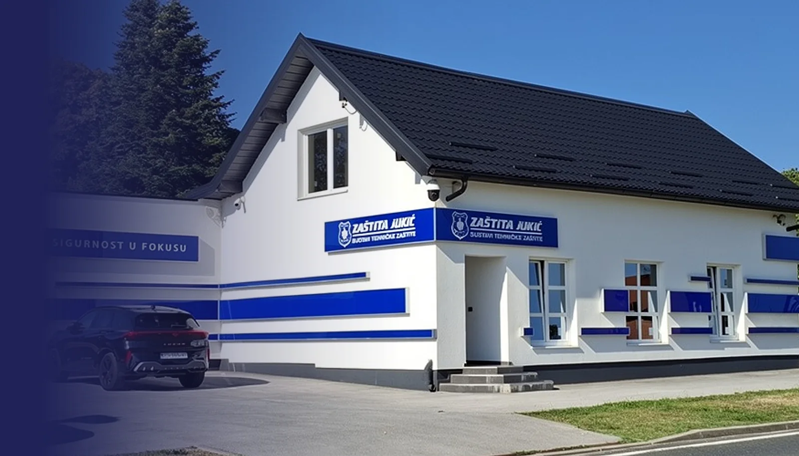 Sjedište Zaštite Jukić: bijelo-plavo pročelje s natpisima Zaštita Jukić i Sigurnost u fokusu